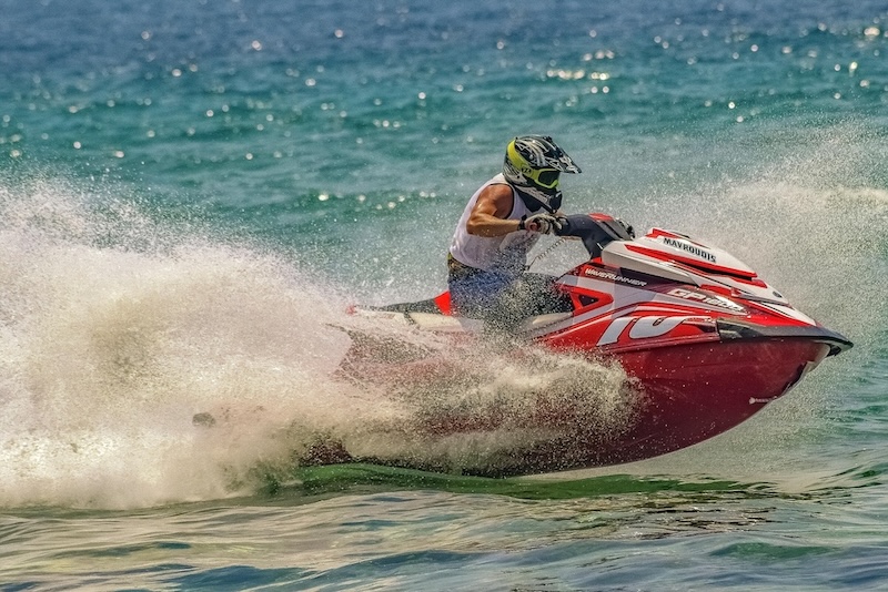 Man riding jet ski during Florida vacation